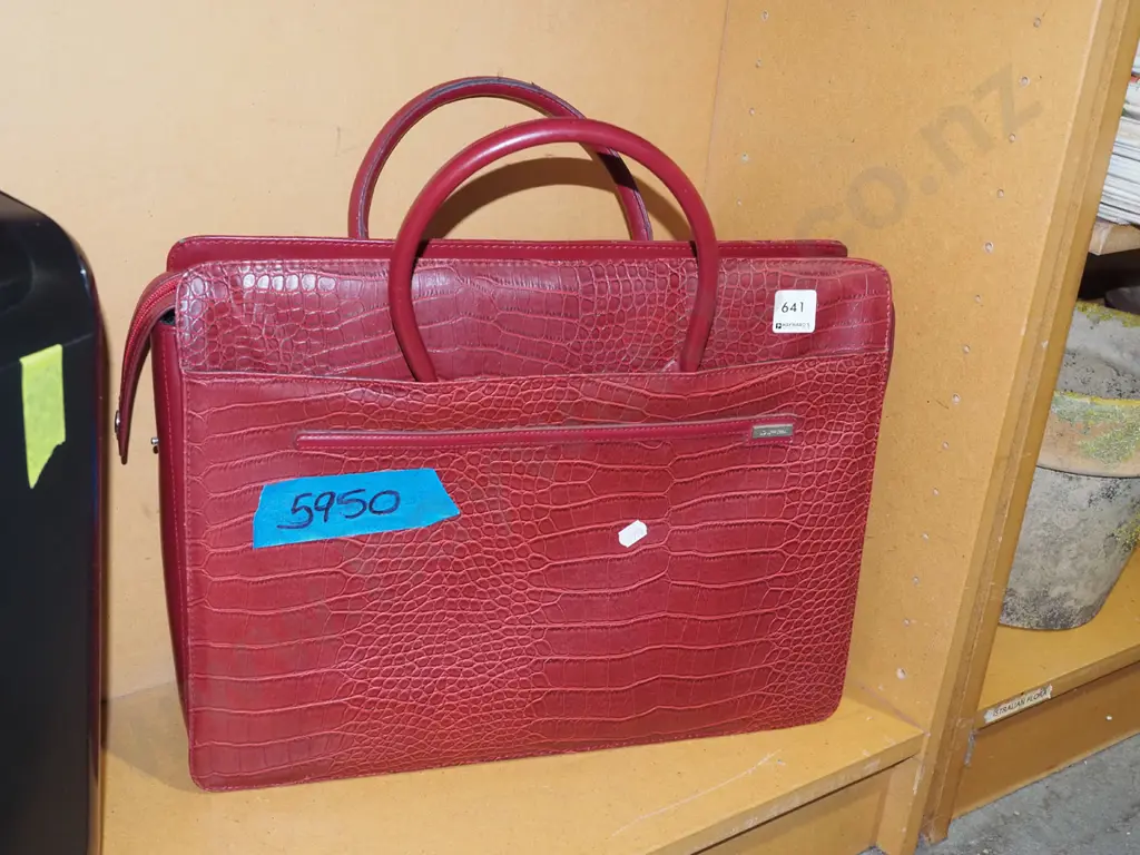 red vinyl hand bag Image 1++