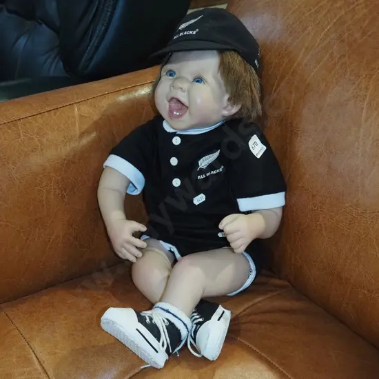 All Black supporter doll