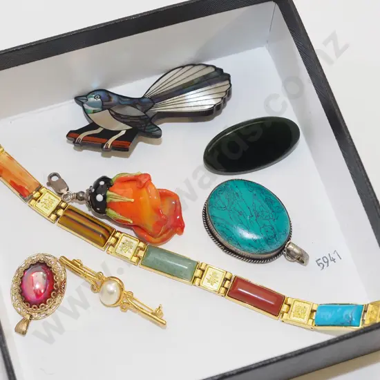 box; polished stone bracelets, pendants, brooches etc