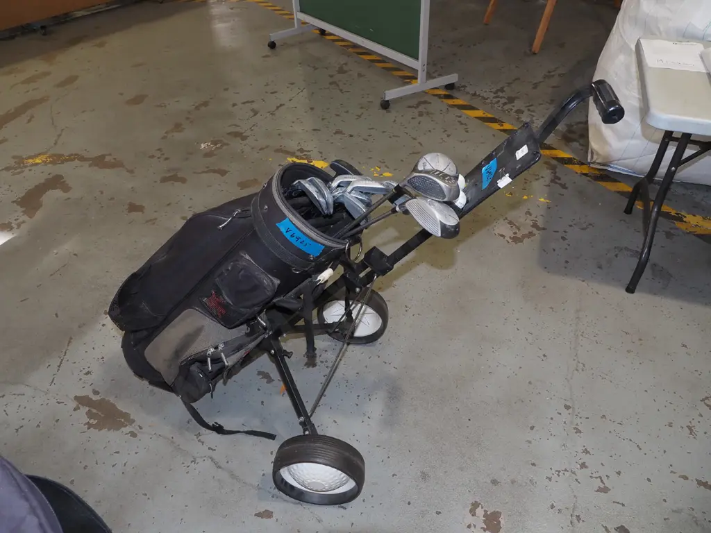 Wilson golf clubs and trundler Image 1++