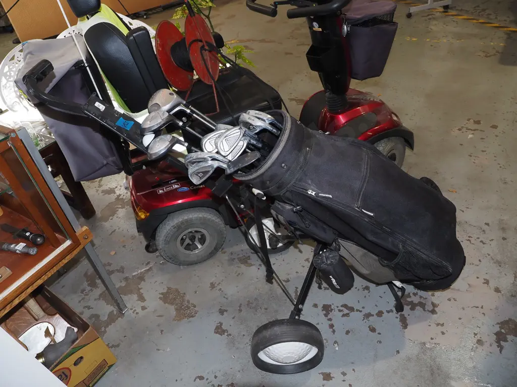 Wilson golf clubs and trundler Image 1++