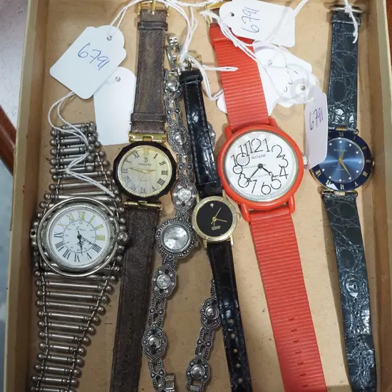 tub of various wristwatches