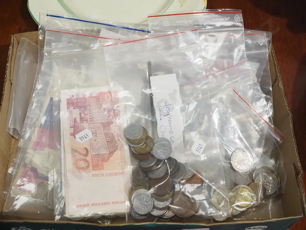 box of various banknotes and coins Image 1++