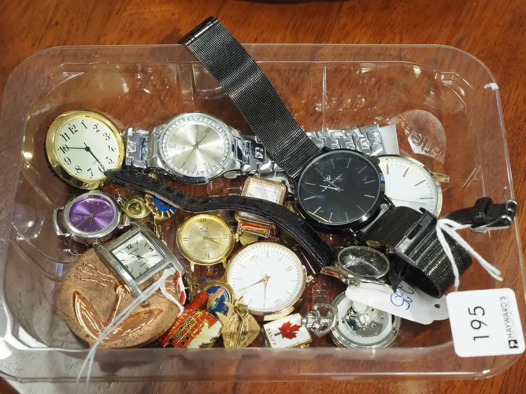 tray of watches and watch parts Image 1++