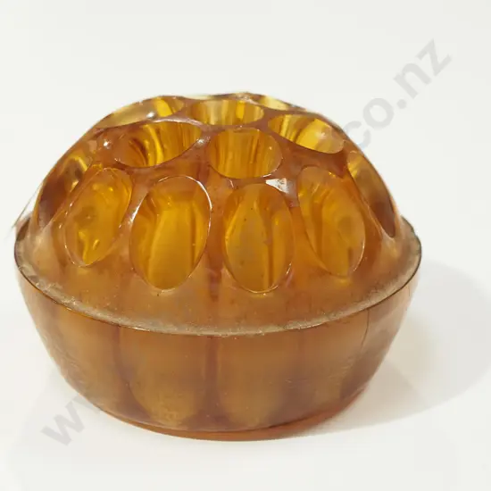 amber glass florist's frog