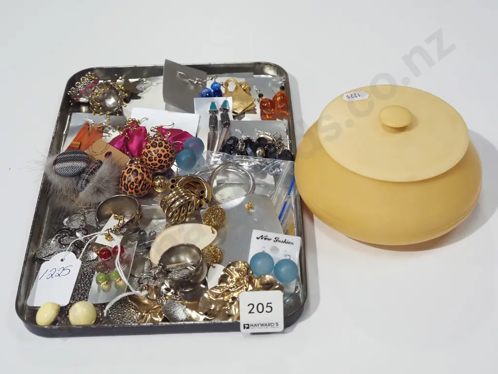 faux ivory trinket box and a tray of costume jewellery earrings Image 1++