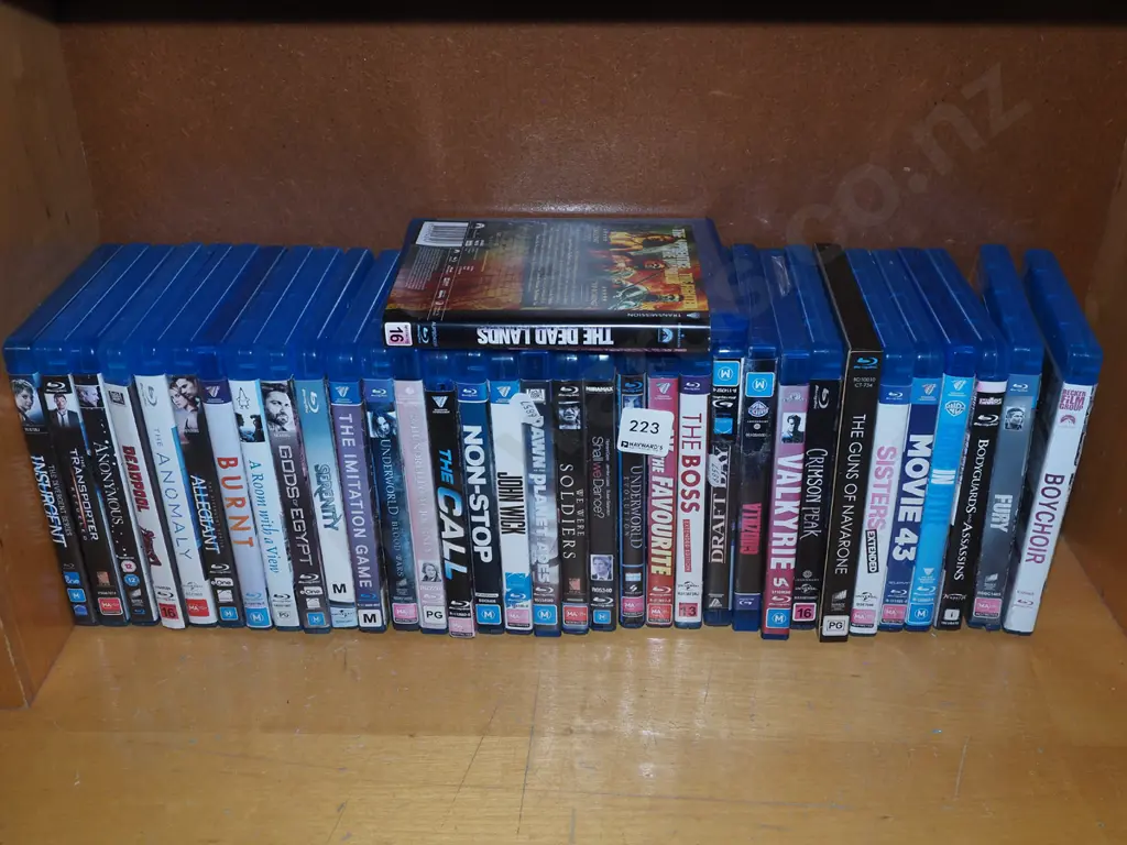 shelf of blue ray and other DVDs Image 1++