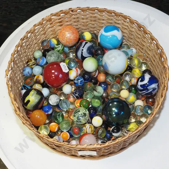 cane basket and marbles
