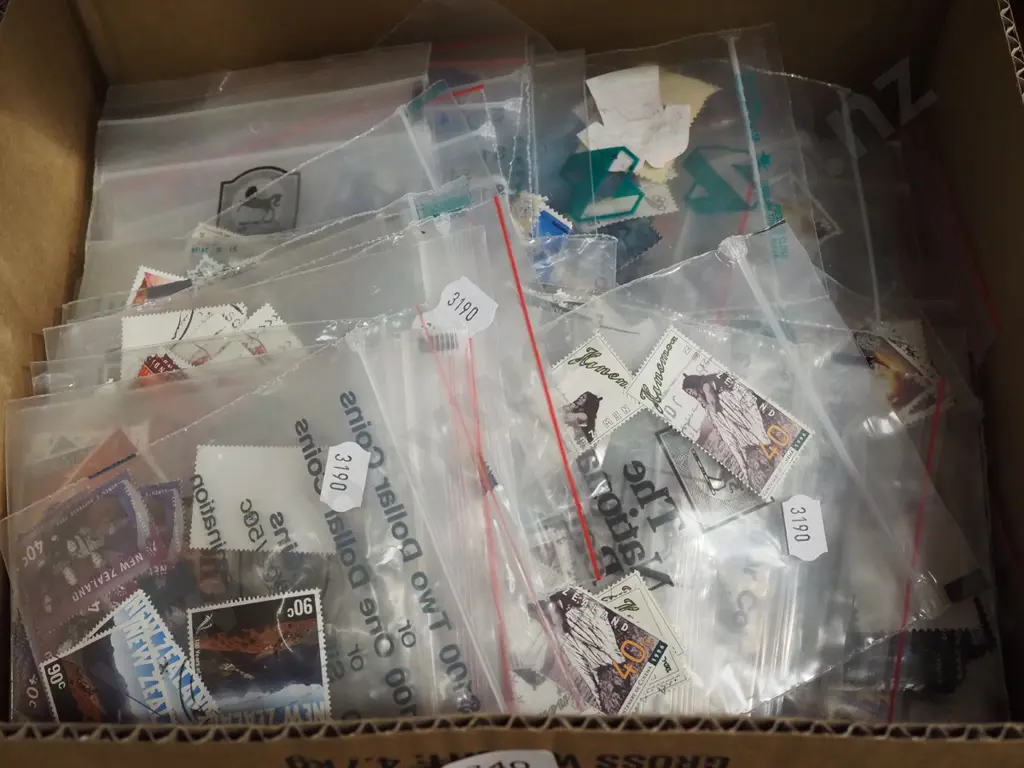 box of NZ stamps Image 1++