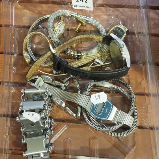 tray of watches and bracelets etc