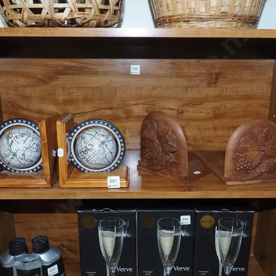 2x pairs of bookends - world globes, carved flowers