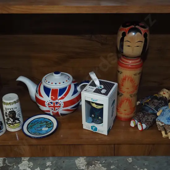 shelf; asian dolls, union jack tea pot, salt and pepper shakers - crack to one etc