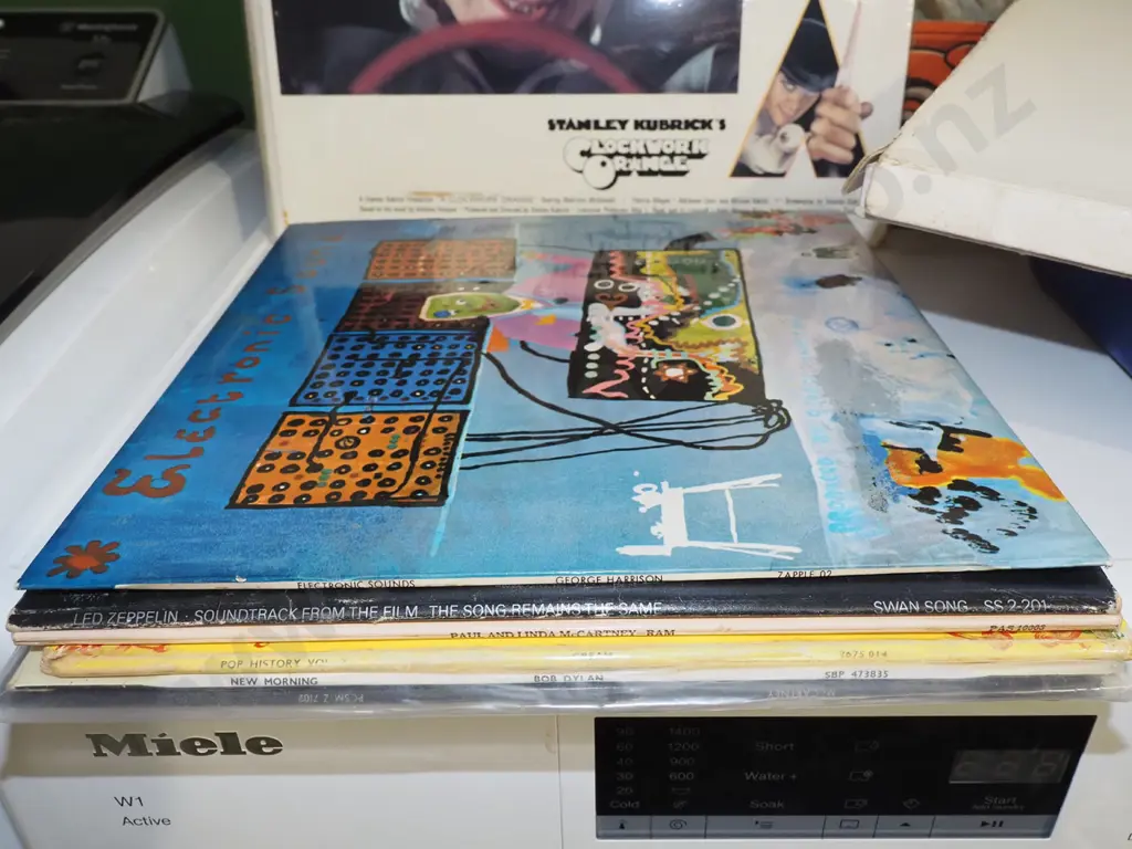 Clockwork Orange laminated promo sheets and assorted LPs: Led Zeppelin, George Harrison, John & Yoko etc. Image 1++