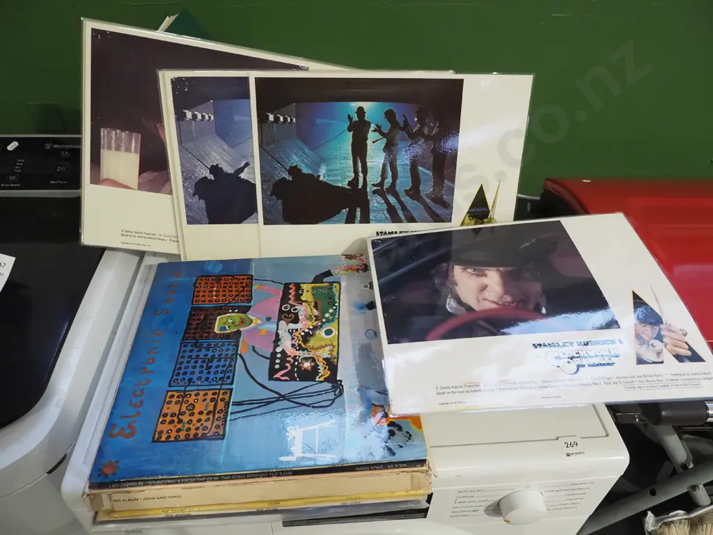 Clockwork Orange laminated promo sheets and assorted LPs: Led Zeppelin, George Harrison, John & Yoko etc. Image 1++