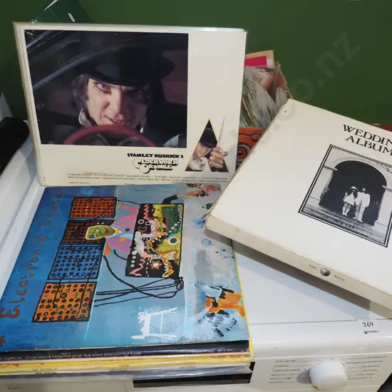 Clockwork Orange laminated promo sheets and assorted LPs: Led Zeppelin, George Harrison, John & Yoko etc.