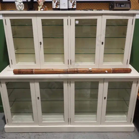 cream-painted 8-door chemist's cabinet with glass shelves - top section separate from base. Overall H1180 W1400 D330