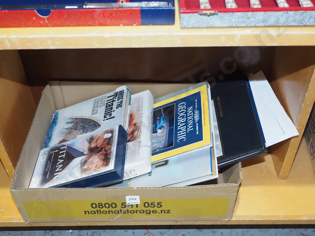 box; Titanic DVDs, books etc Image 1++