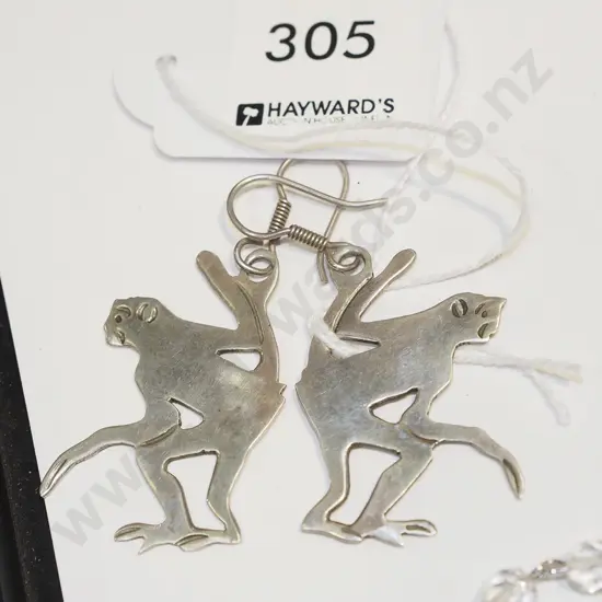 pair of sterling silver monkey earrings