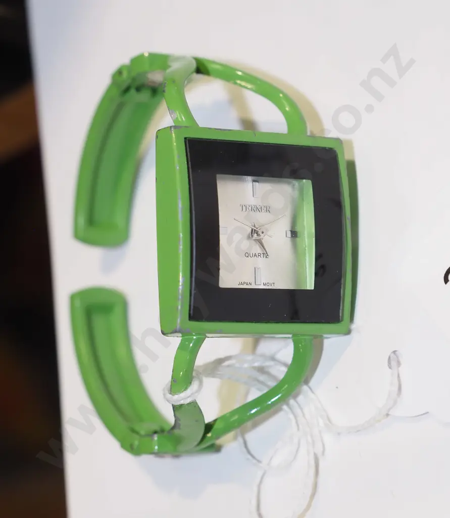 green bangle style wristwatch Image 1++
