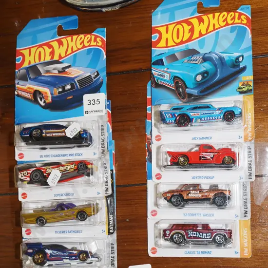 8x as new carded Hotwheels vehicles