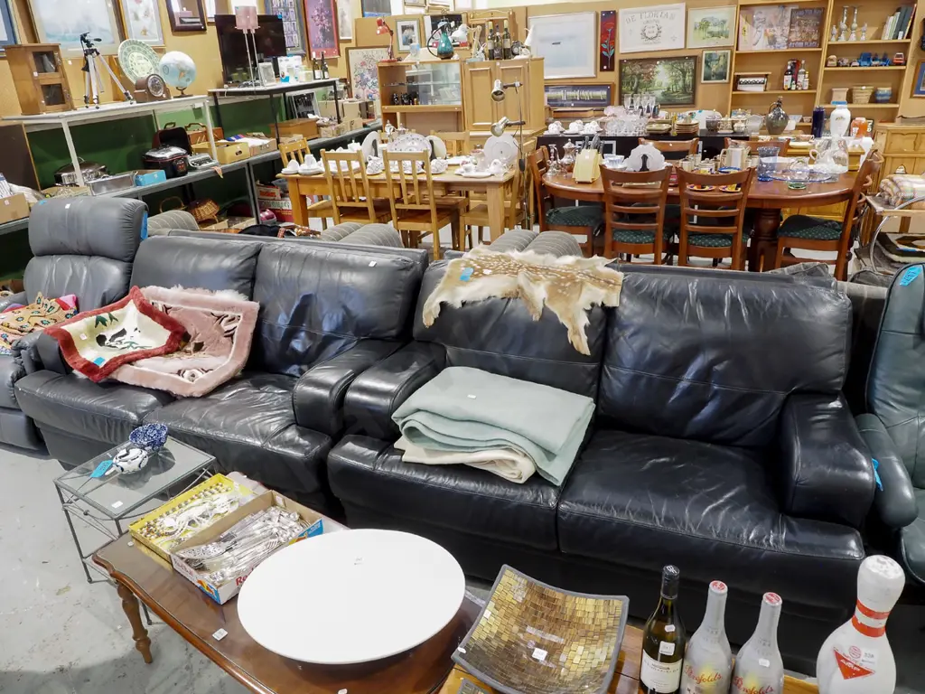 black leather 2 piece lounge suite - with 2x 2 seater settees - some damage to leather Image 1++