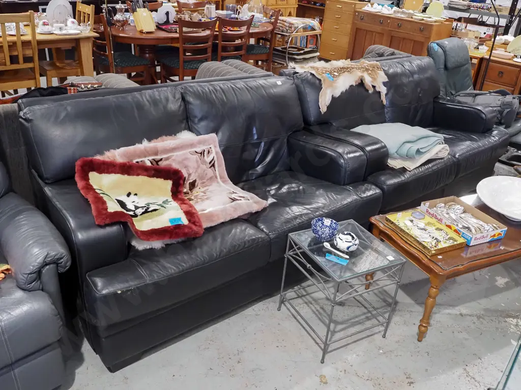 black leather 2 piece lounge suite - with 2x 2 seater settees - some damage to leather Image 1++