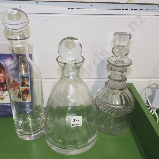 3x stoppered crystal decanters H340
