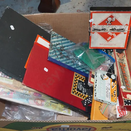 box; various board games, dominoes etc