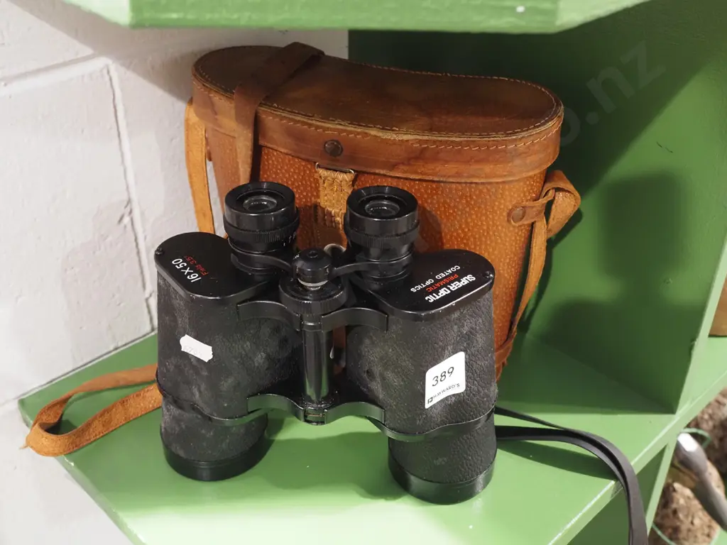 pair of Super Optic 16x50 field binoculars Image 1++