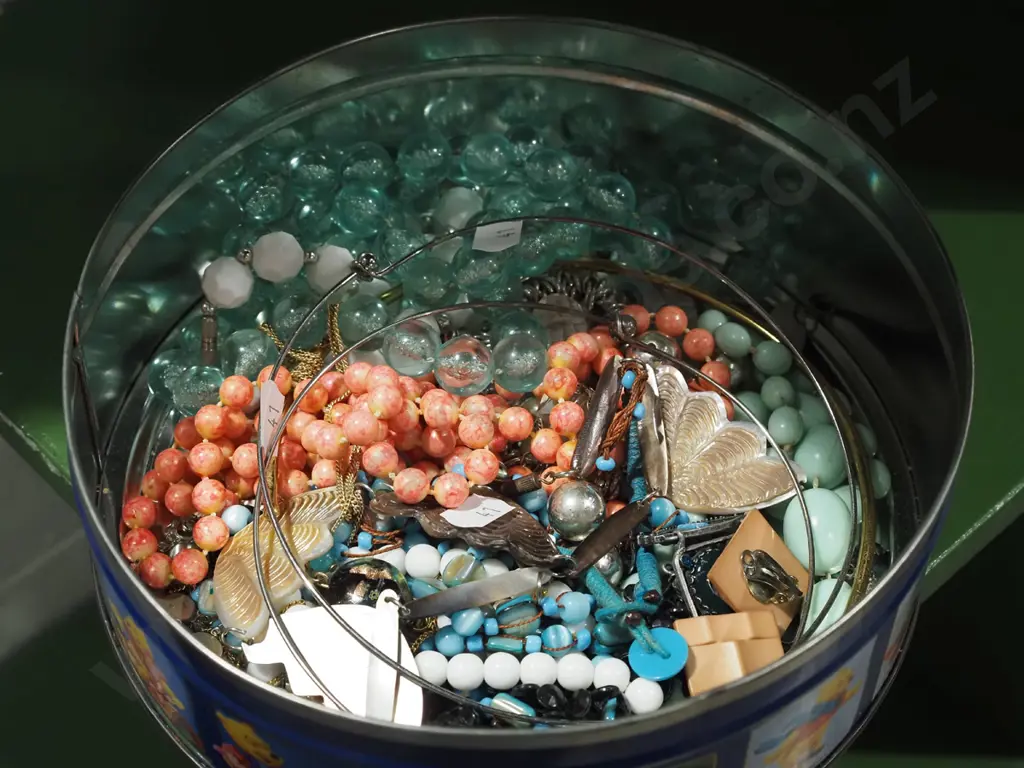 tin of costume jewellery Image 1++
