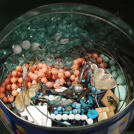 tin of costume jewellery