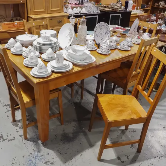 solid rimu extending dining table with 6 matching slat back pressed wood chairs