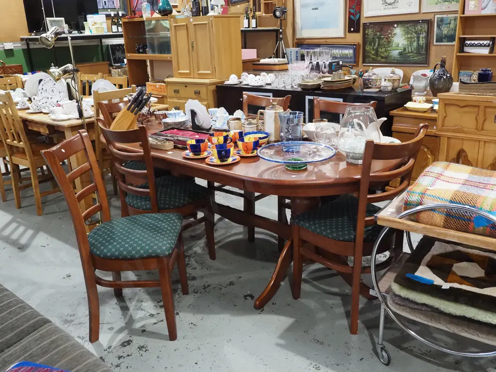 Indonesian hardwood refectory based dining table with 6 green upholstered ladder back chairs  Image 1++