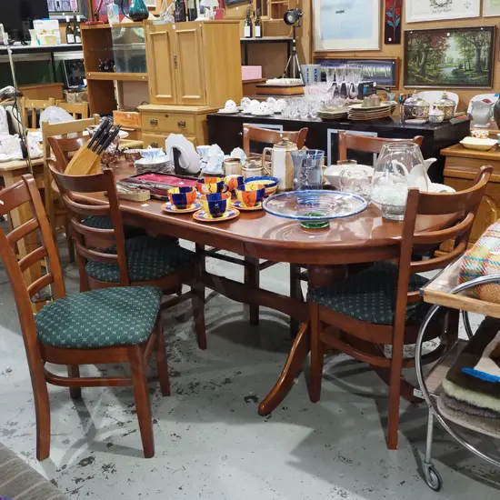 Indonesian hardwood refectory based dining table with 6 green upholstered ladder back chairs 