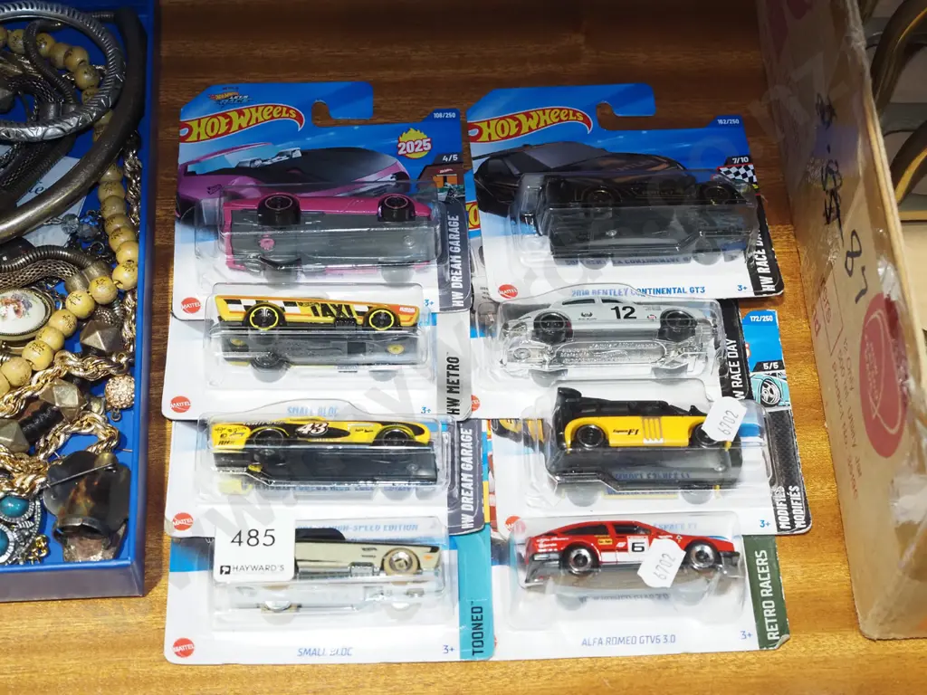 8x as new carded Hotwheels vehicles Image 1++