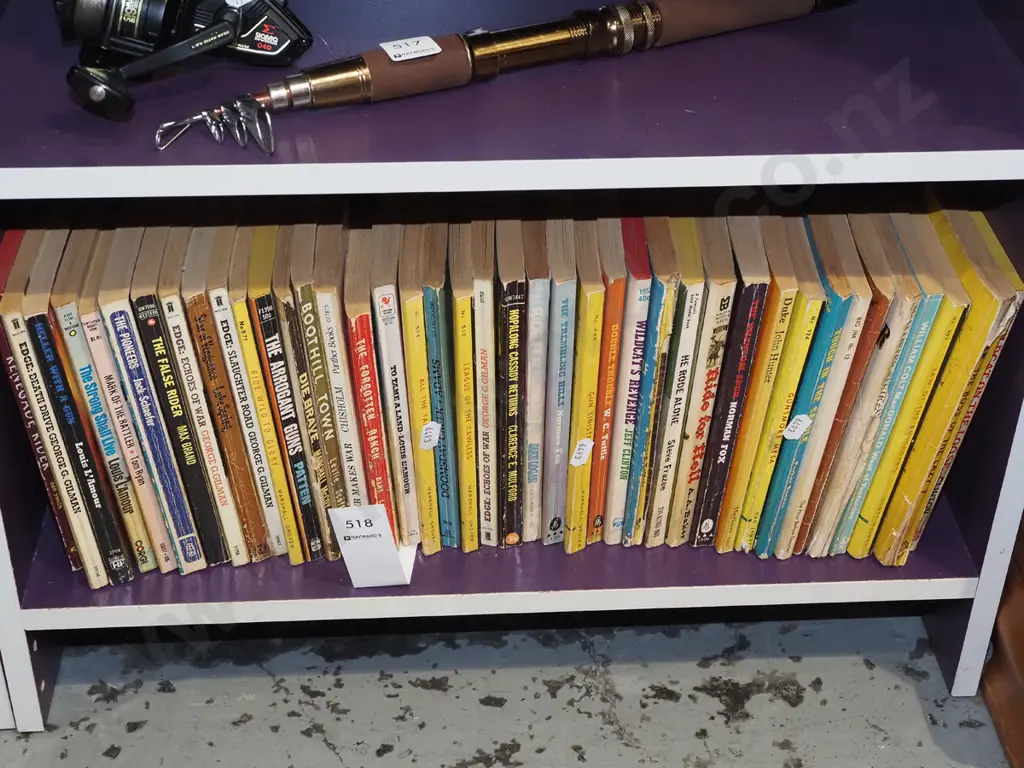 shelf of paperback Western novels Image 1++