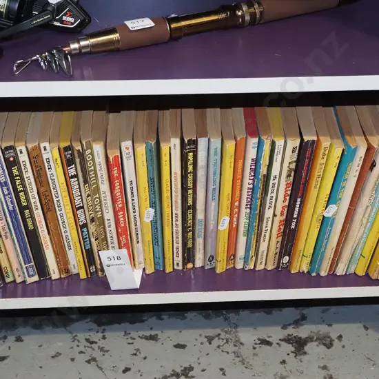 shelf of paperback Western novels