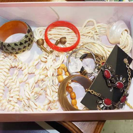 box; bangles, shell necklaces etc
