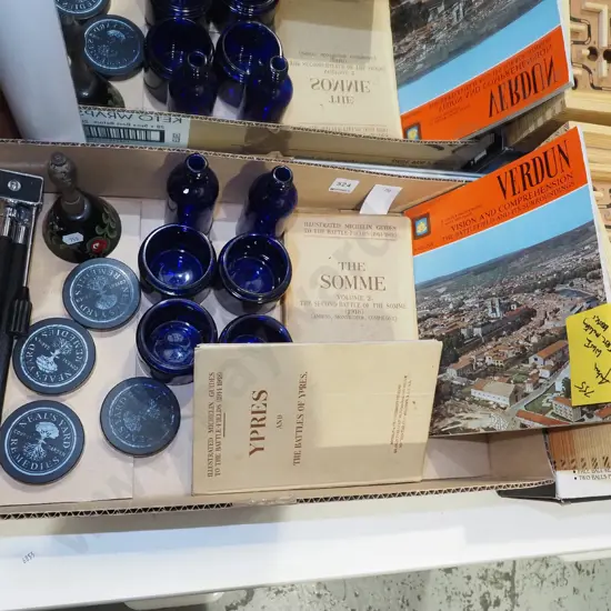 box; small camera tripod, blue glass chemist jars, bell etc