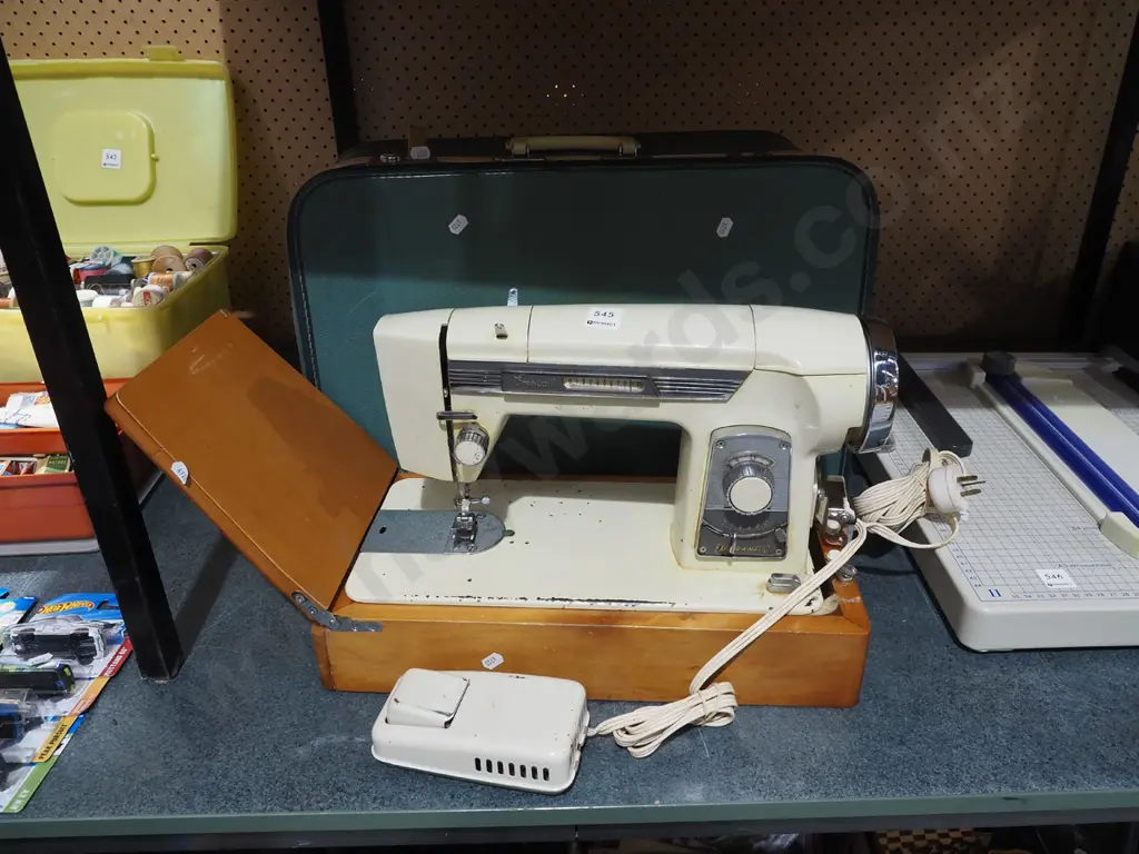 Empisal sewing machine Image 1++