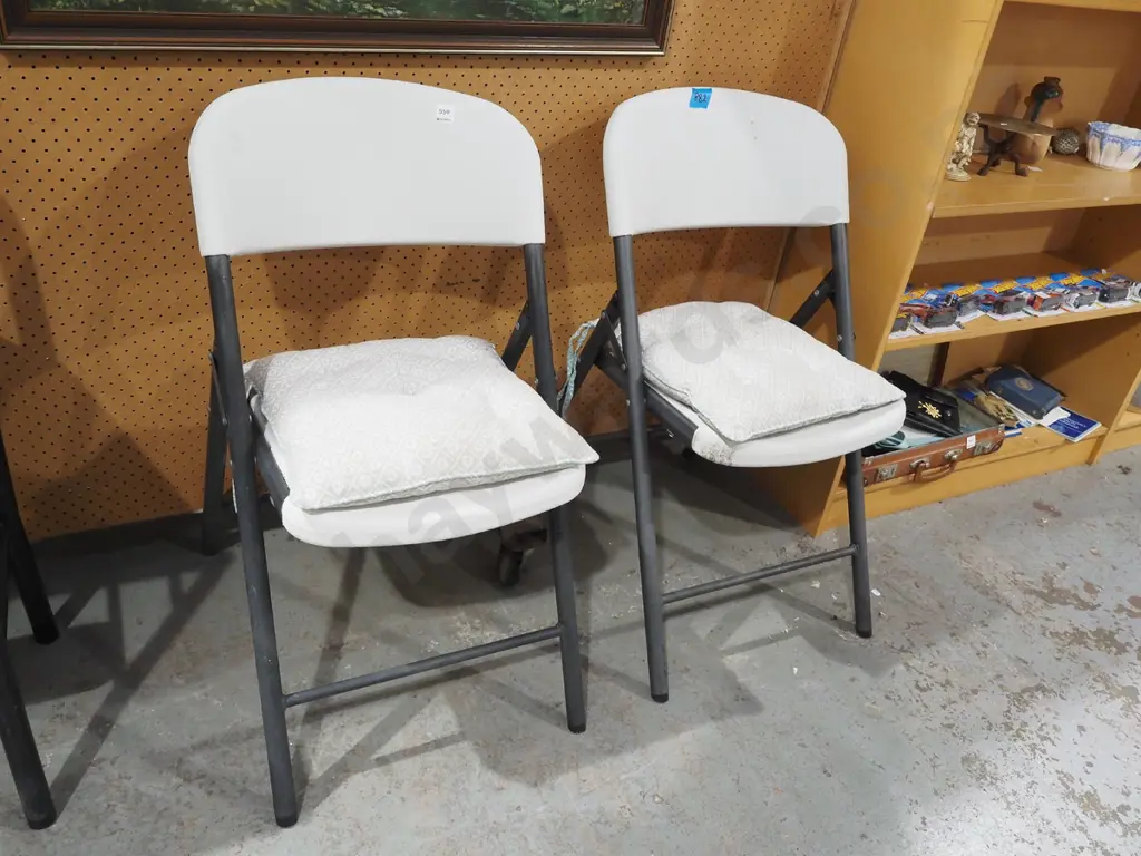 2x metal and plastic foldaway outdoor chairs with cushions Image 1++