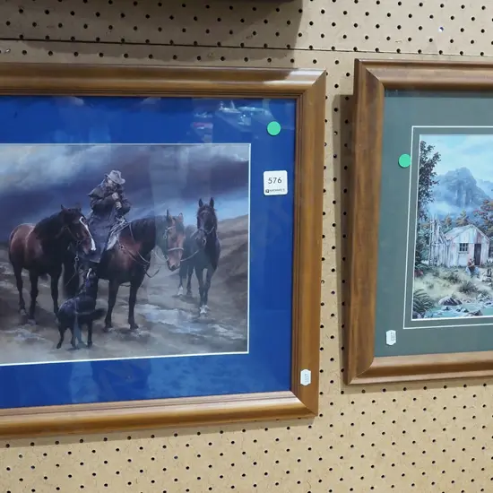 2x framed prints - stockmen and horses , hut - green dots