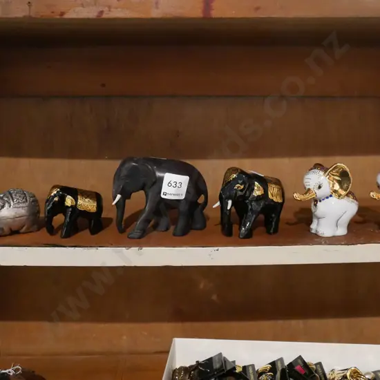 shelf of elephant figurines