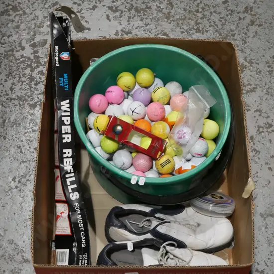 box; golf shoes, golf balls, wiper blade refills etc
