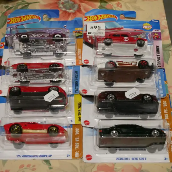 8x as new carded Hotwheels vehicles