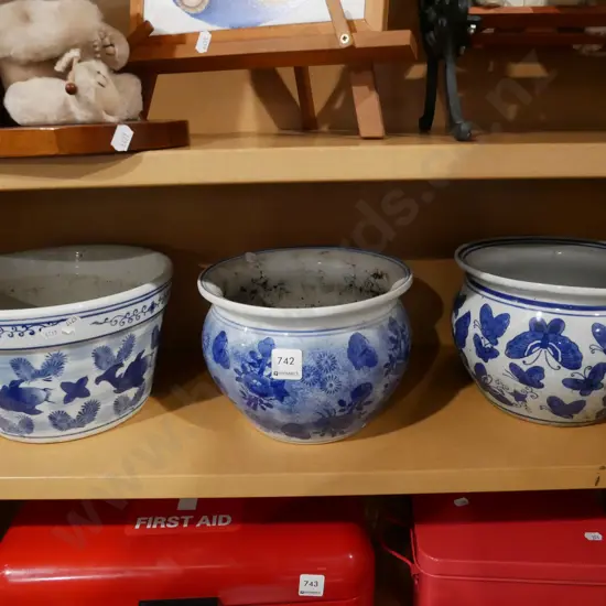 3x blue and white planters