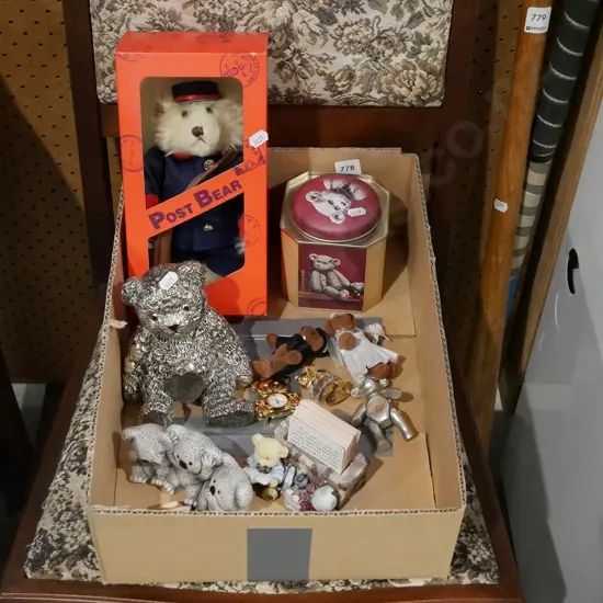 box of teddy bear items; tin, figurines, badges etc