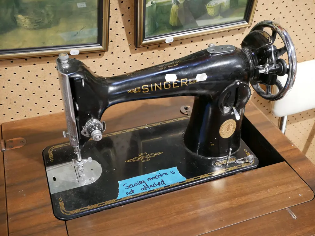 Singer treadle sewing machine in cabinet - machine not attached Image 1++