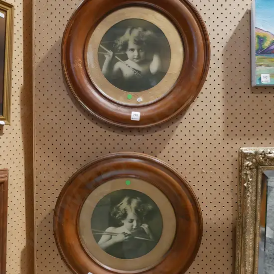 2x circular wood framed cherub prints - green dots Diam 450