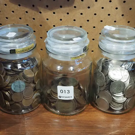3x glass jars of coins